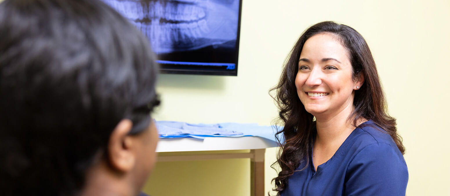 doctor speaking with patient at Spring Lake Oral Surgery